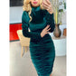 a woman standing in front of a mirror holding a cell phone 